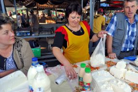 Irina Fedirko sells curd of own preparation