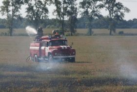 A fireman extinguishes a fire