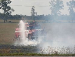 A fireman extinguishes a fire