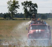 A fireman extinguishes a fire
