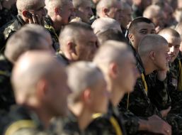 Cadets walk near a tree