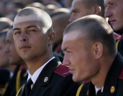 Cadets walk near a tree