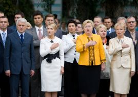 Participants of ceremony of getting up of the State flag of Ukraine