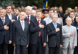 Participants of ceremony of getting up of the State flag of Ukraine