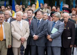 Participants of ceremony of getting up of the State flag of Ukraine
