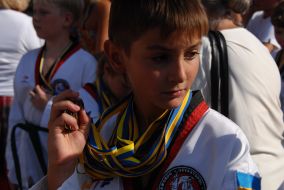 Participant of parade, devoted to the Sport and Physical Education Day