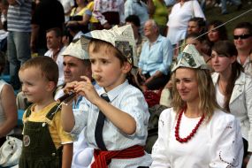 A boy plays on pipe