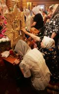 Believers put icons to Pochaev Icon of the Mother of God