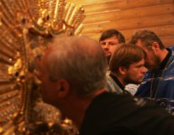 A believer kisses Pochaev Icon of the Mother of God