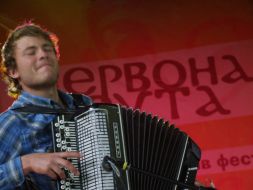 Participants of group plays on a bayan