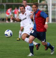 Andrey Yeshchenko and Dario Srna