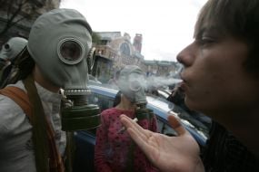 Flash-mob participants smokes