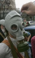 Flash-mob participants wearing in gas-masks