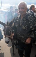 A man with a donkey