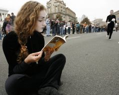 A mime reads