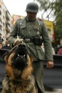Soldier holds a sheep dog