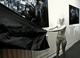 Naked model near a photo