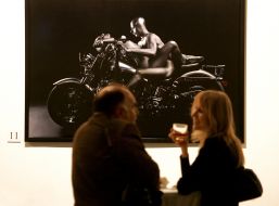 Visitors near a photo with representing naked bikers