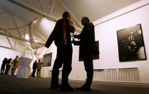 Visitors near a photo with representing naked bikers