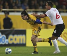 Artem Milevskiy and John Terry