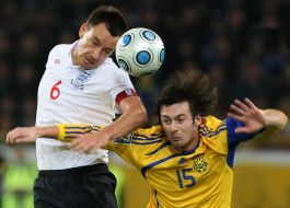 Artem Milevskiy and John Terry