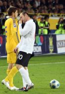 Wayne Rooney and Yaroslav Rakitskiy