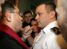 Kirill Kulikov swears with a guard