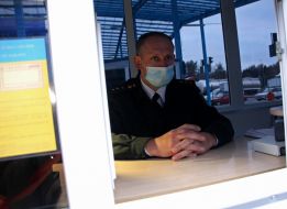 A border guard in a respirator mask