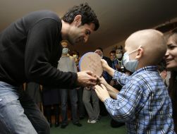 A boy gives Luis Figo gift
