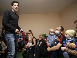 Luis Figo during a visit in a rehabilitation center
