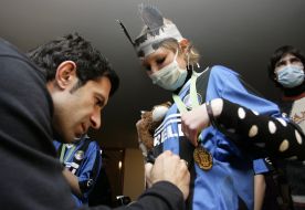 Luis Figo an autograph puts on a sport shirt