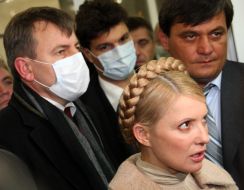 Yuliya Timoshenko, Nikolay Kmit and Mikhail Livinskiy