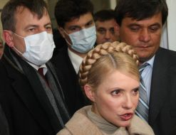Yuliya Timoshenko, Nikolay Kmit and Mikhail Livinskiy