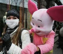 A man in the suit of pig