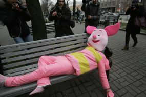 A man in the suit of pig