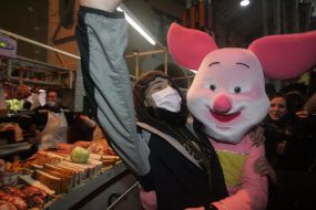 A man in the suit of pig