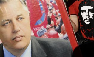 Placard with representing Petr Simonenko