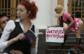 The ”FEMEN” womanish motion activist holds a placard