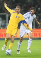 Evgeniy Khacheridi and Angelos Charisteas