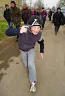 A boy demonstrates a toy pistol