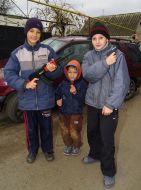 Boys demonstrate a toy weapon
