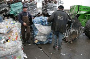 Workers assort garbage