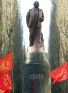 Poured by a red paint monument to Lenin