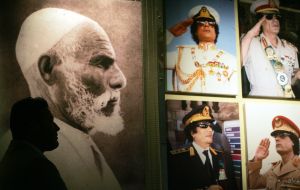 Муамар Каддафи