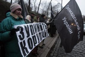 Participants of protest action against a corruption