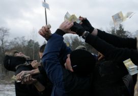 The participants of game catch a money