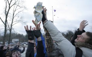 The participants of game catch a money