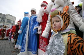 A boy in the suit of tiger