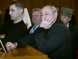 Deputies of Crimea Parliament lock a tribune