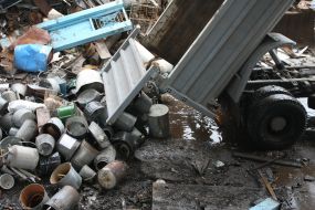 Unloading of hootch still